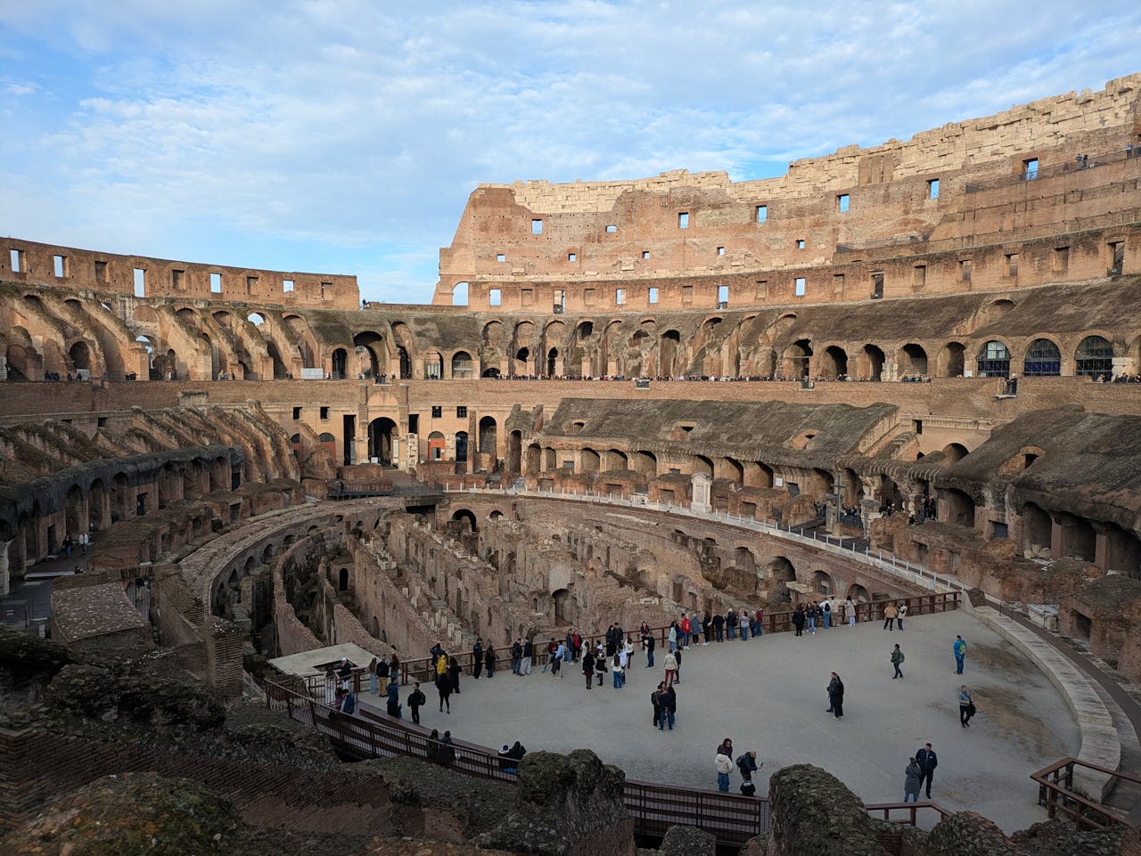 services-02 Explore the iconic Colosseum in Rome, showcasing its grand architecture and historical significance.